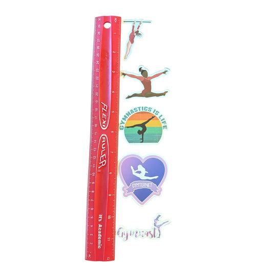 A set of gymnastics-themed stickers displayed next to a red plastic ruler for scale, on a plain white background.