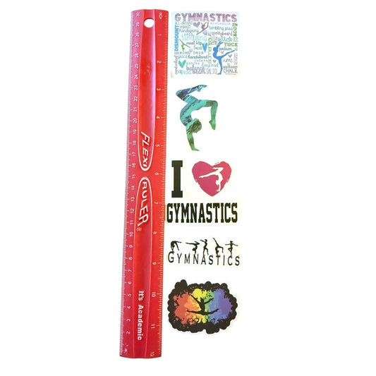 A red 12-inch academic ruler shown vertically next to a sheet of gymnastics-themed stickers on a plain white background.