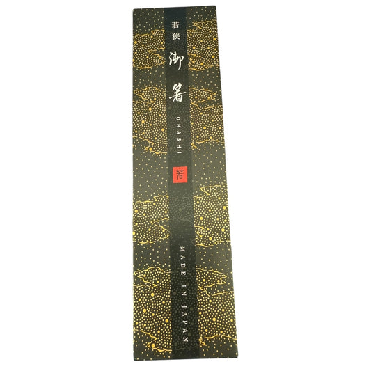 A tall, narrow black product box with gold dotted patterns and Japanese text, 'MADE IN JAPAN', on a plain white background.