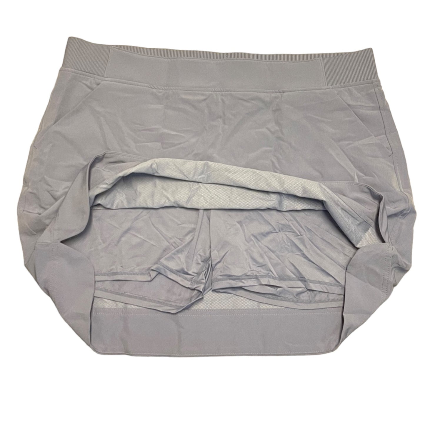 Purple skort showing shorts on a white background