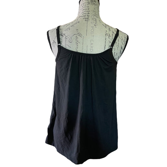 Black sleeveless top on a mannequin with a white background