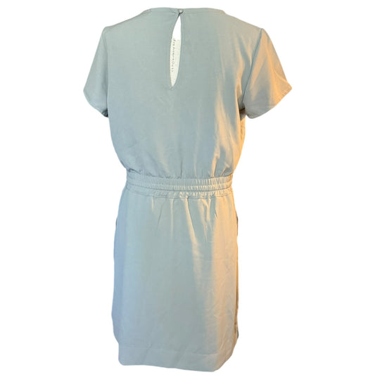 Gray dress with a open design on a white background