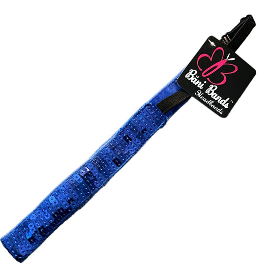 A blue sequined headband and a black retail hangtag.