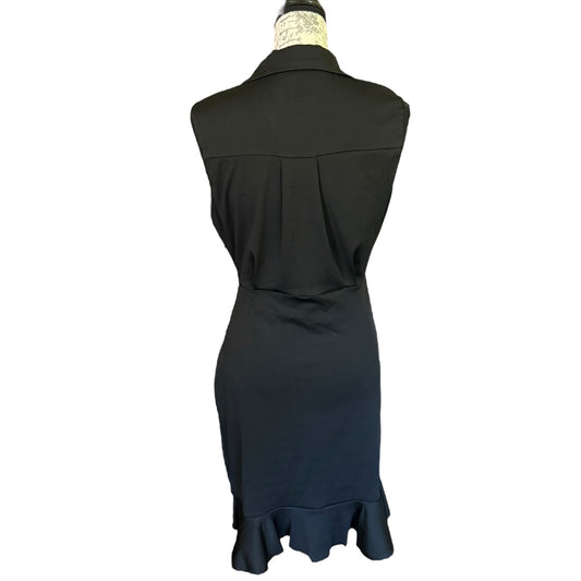 A sleeveless black dress with a ruffled hem, displayed from the back on a mannequin against a plain white background.