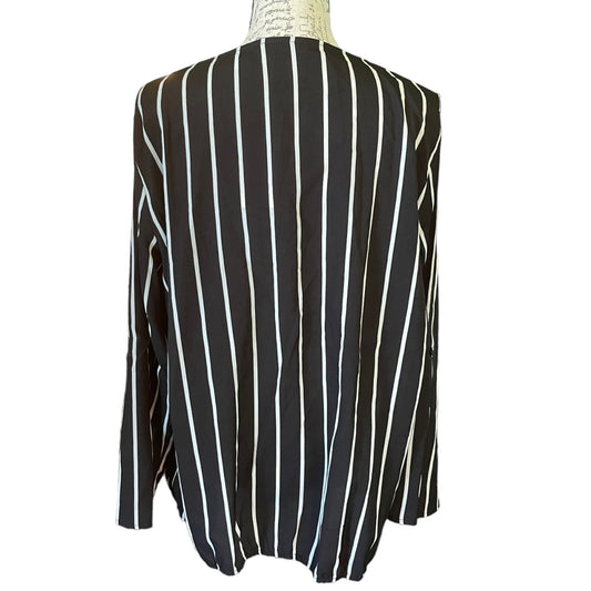 A black long-sleeve blouse with vertical white stripes, displayed on a mannequin torso against a plain white background.