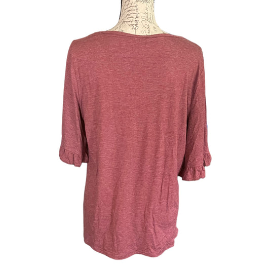 A heathered red short-sleeve top displayed on a cream-colored dress form mannequin against a plain white background.