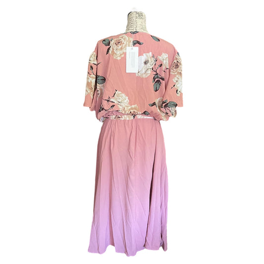 Back of Pink floral dress on a mannequin with a white background