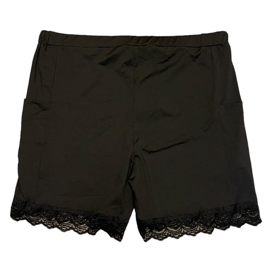 Back of Black shorts with lace trim on a white background