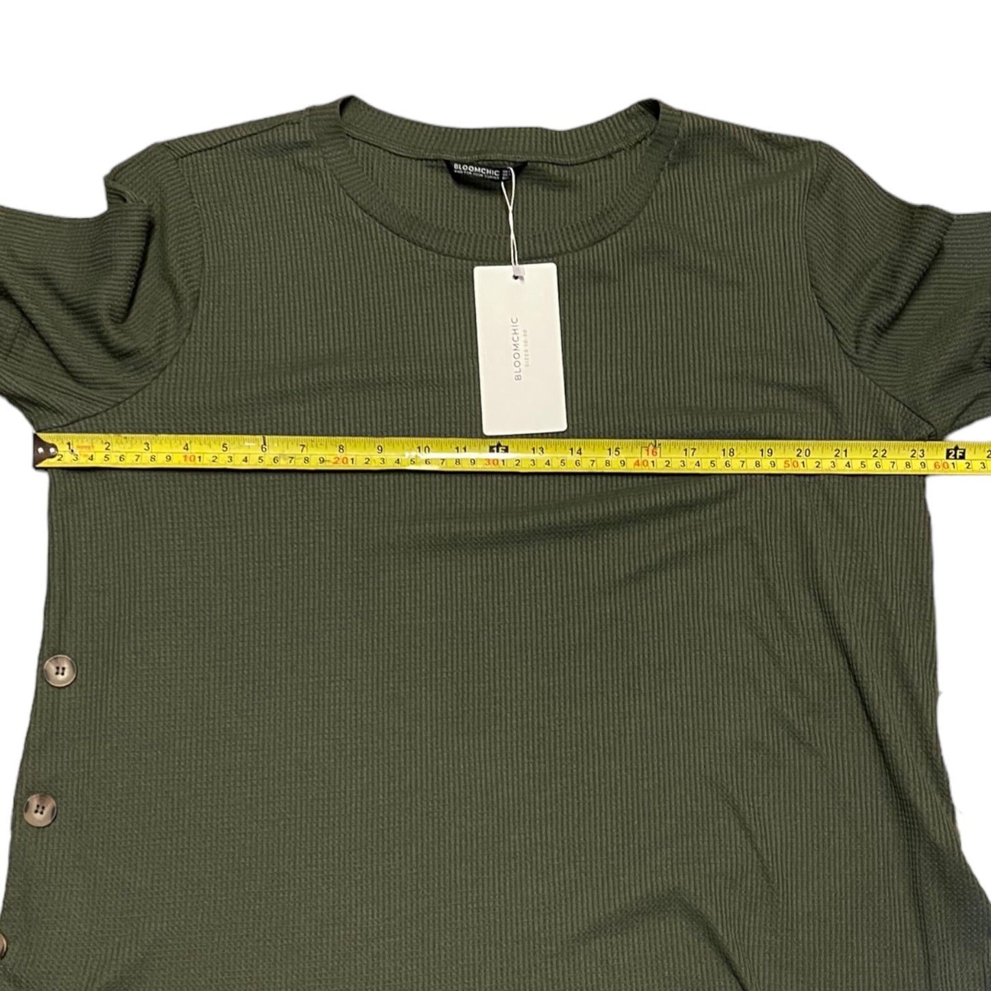 Pit to pit of green shirt