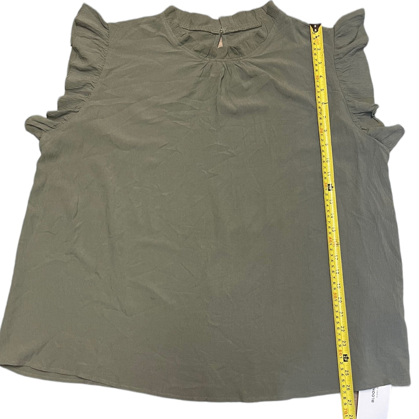 Length of green shirt