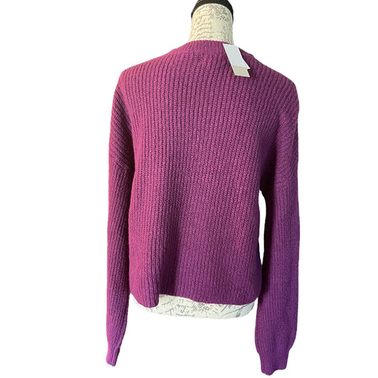 A purple ribbed knit sweater displayed on a mannequin torso against a plain white background.