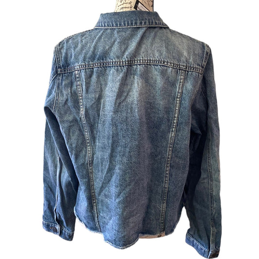 Blue denim jacket on a white background