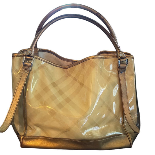 A Gold & plaid handbag with a glossy finish, featuring a subtle plaid pattern, dual top handles, and a shoulder strap, set against a plain white background.