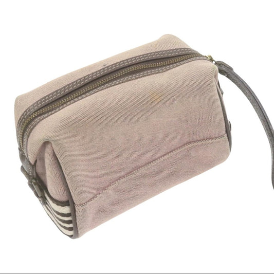 Back of pink bag with a strap on a white background