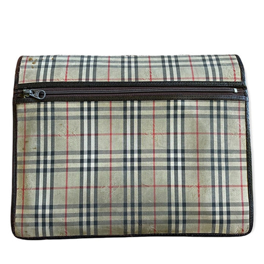 A vintage plaid canvas pouch with a dark brown zipper, featuring a beige, black, and red checkered pattern.