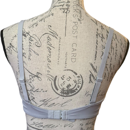 Back of gray bra on a white back ground