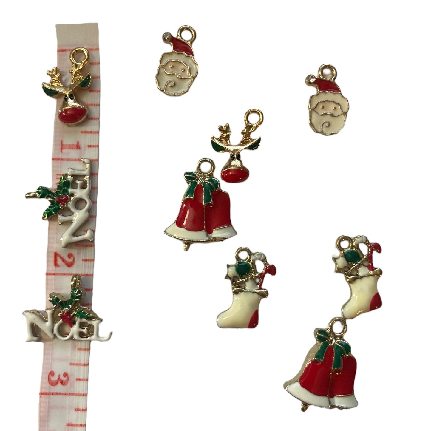 Set of Christmas-themed charms on a measuring tape