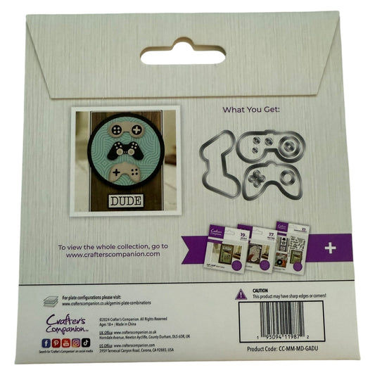 Package of crafting dies with game controller design and 'DUDE' text on a beige background.