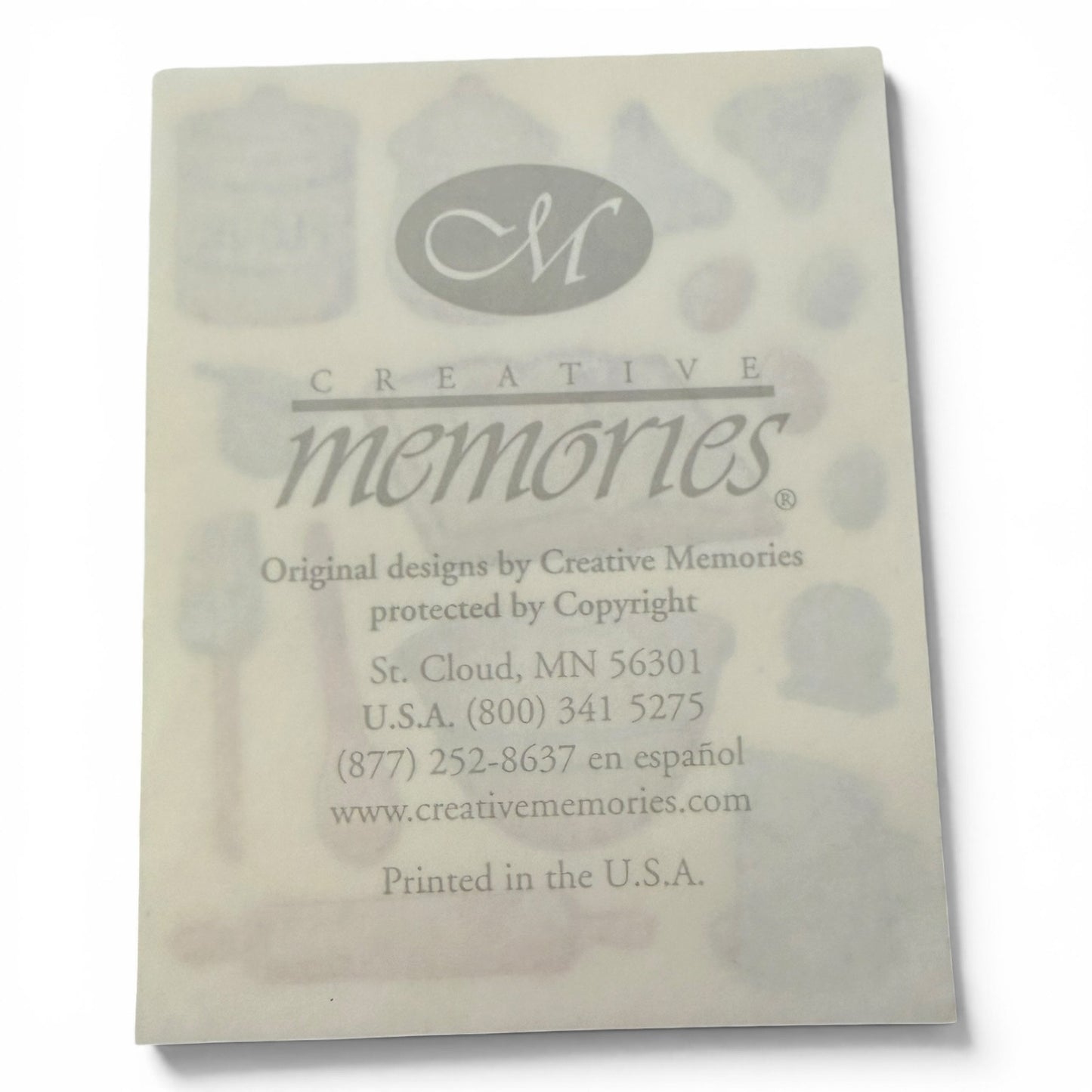 Back of a product packaging with 'Creative Memories' branding and contact information.
