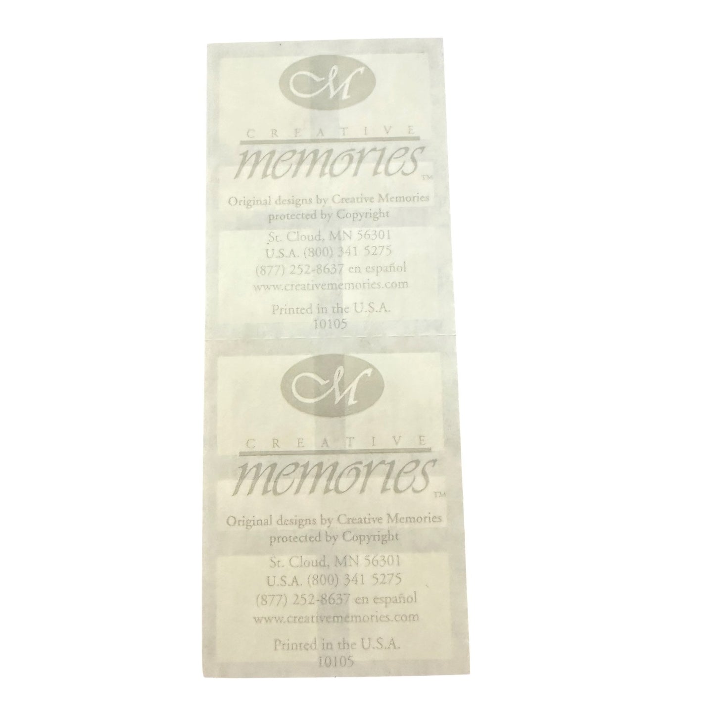 White sticker sheet back printed with the logo and name 'Creative Memories' along with contact information.