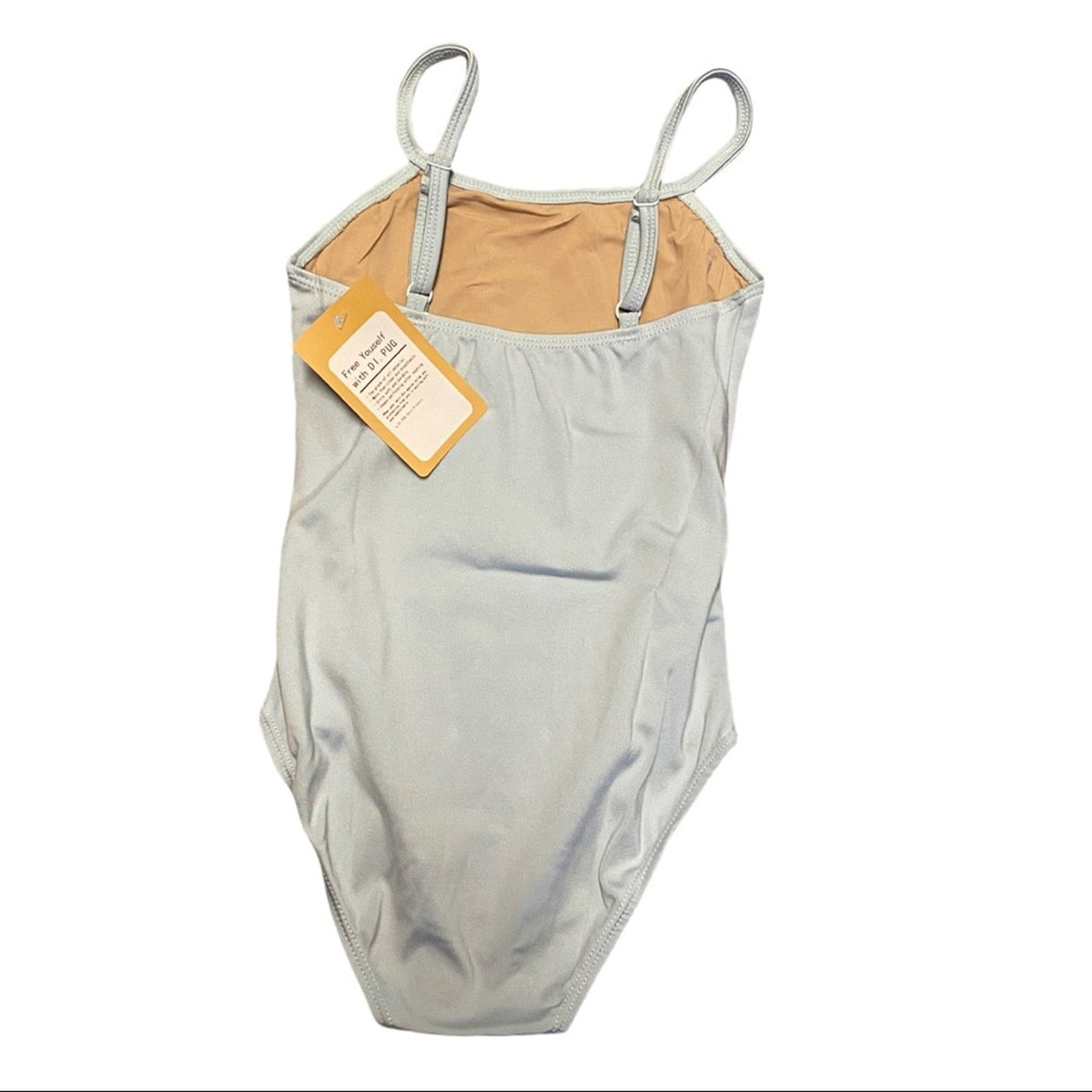 A blue leotard with thin shoulder straps, a tan lining, and a yellow brand tag attached, shown against a plain white background.