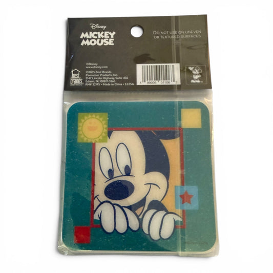 Packaged Disney Mickey Mouse bath tiles in a clear plastic wrapping on a white background