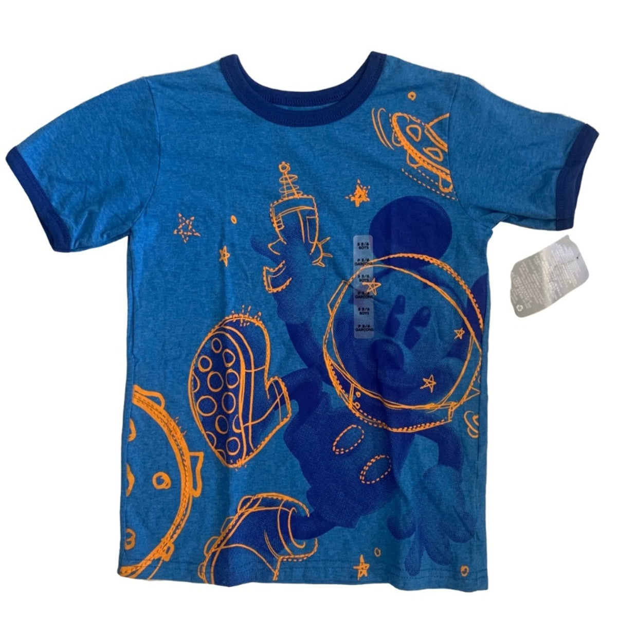 A kids' short-sleeve ringer t-shirt in blue with a dark blue crew neck and cuffs, featuring an orange and dark blue space-themed graphic print of an astronaut, rocket, and UFO. A white paper tag is attached to the right side.