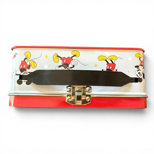 Red and white lunch box with cartoon character design on a white background