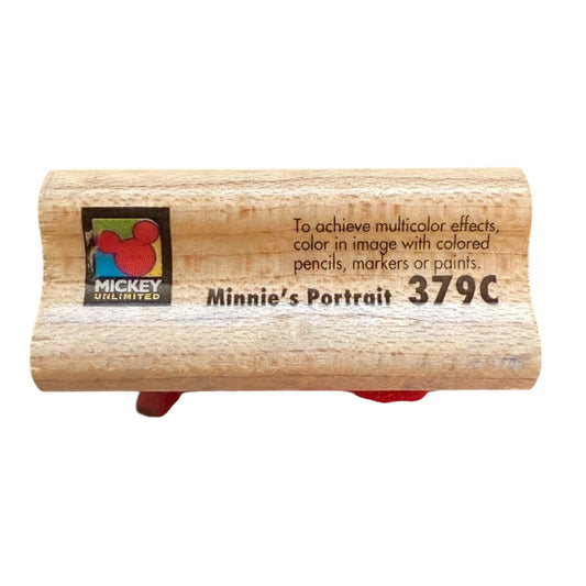 Wooden stamp with 'Mickey Mouse' logo and text on a white background