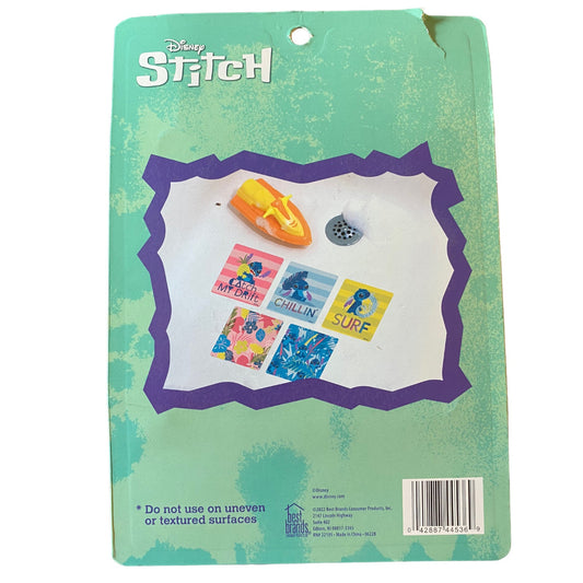 Packaged Disney Stitch product with colorful designs on a green background