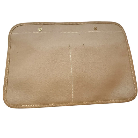 Back of brown purse insert on a white back ground