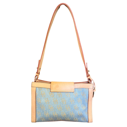 Handbag with blue patterned body and beige accents on a white background