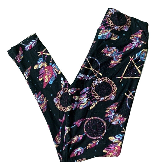 Black leggings with a colorful dreamcatcher and feather pattern, laid flat on a white background.