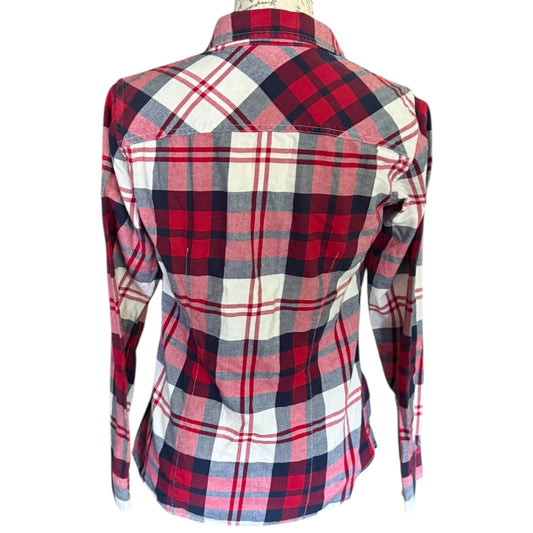 A long-sleeve plaid button-up shirt displayed on a mannequin torso, featuring a red, navy, and off-white tartan pattern.