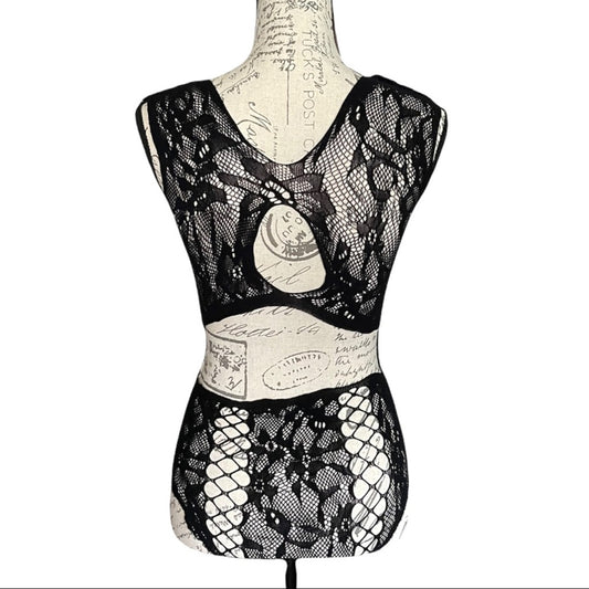 Black fishnet sleeveless lingerie top and bottoms displayed on a vintage-style mannequin torso against a white background.