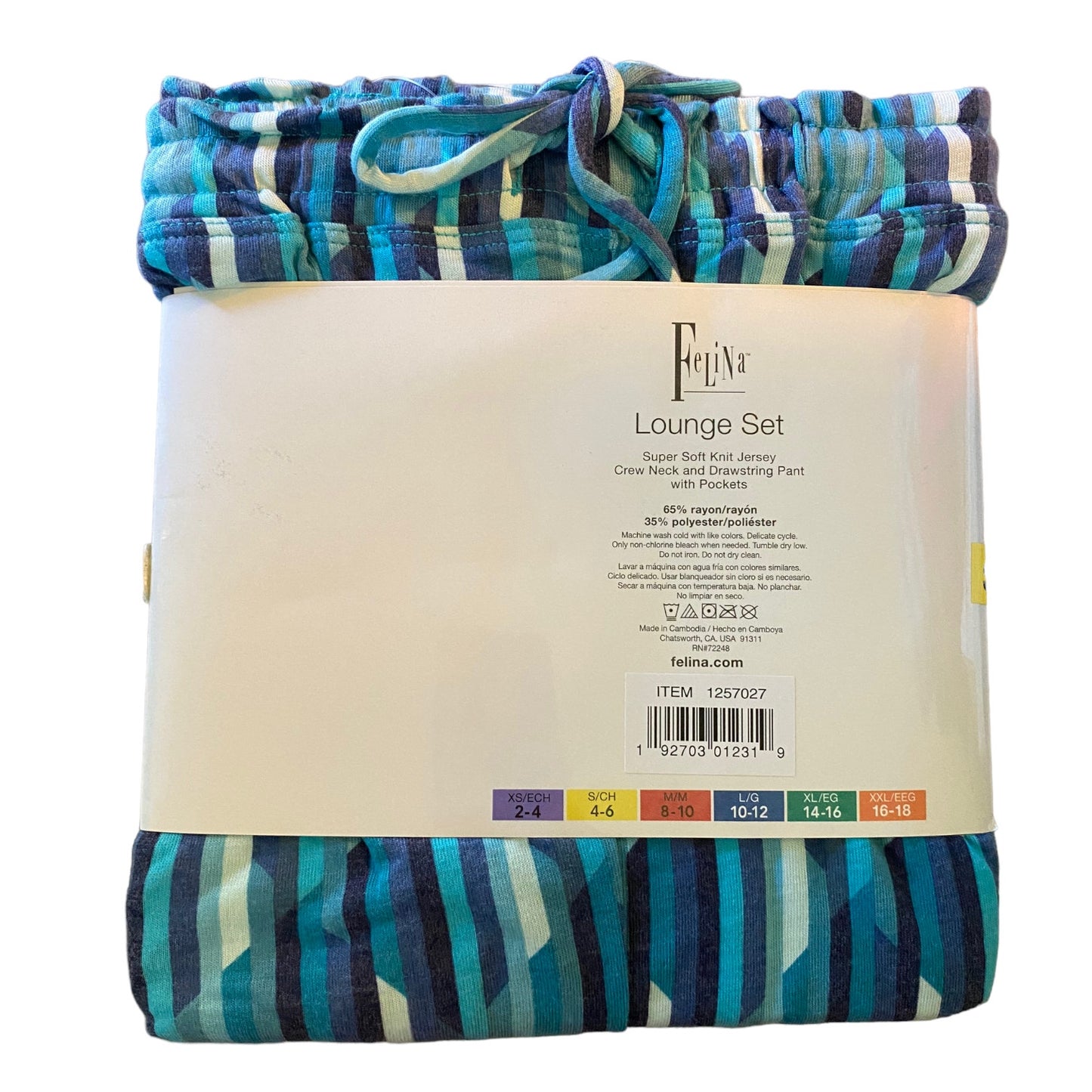 A folded lounge set by Feltina, featuring a striped knit drawstring pants in shades of blue, teal, and navy, wrapped in a white paper band with product details.