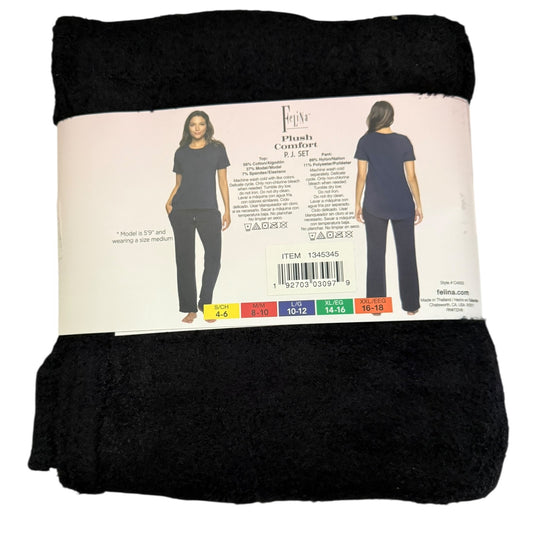 Black plush pajama set with packaging displaying size chart on a white background