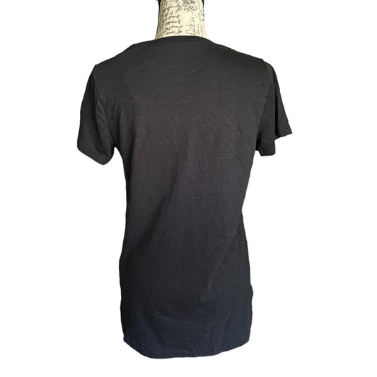 Back of Black t-shirt on a mannequin with a white background