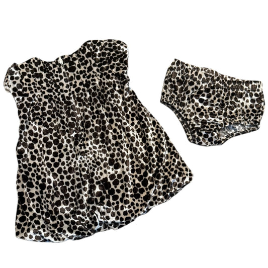 A matching two-piece children's outfit set featuring a sleeveless top and shorts in leopard print pattern, shown on a plain white background.
