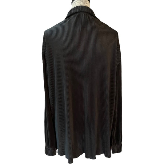 Back of Black ribbed sweater on a mannequin against a white background