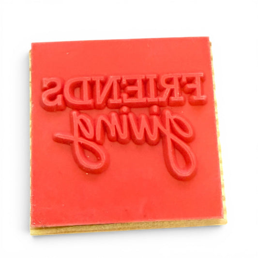 Red stamp with 'Friends Stamp' text on a white background
