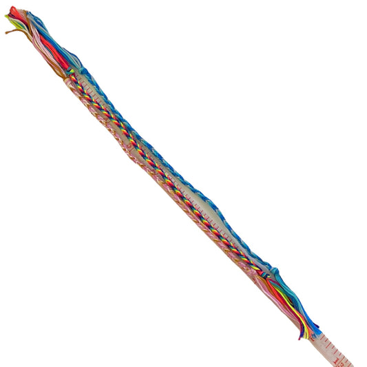 Colorful braided bracelets on a white background