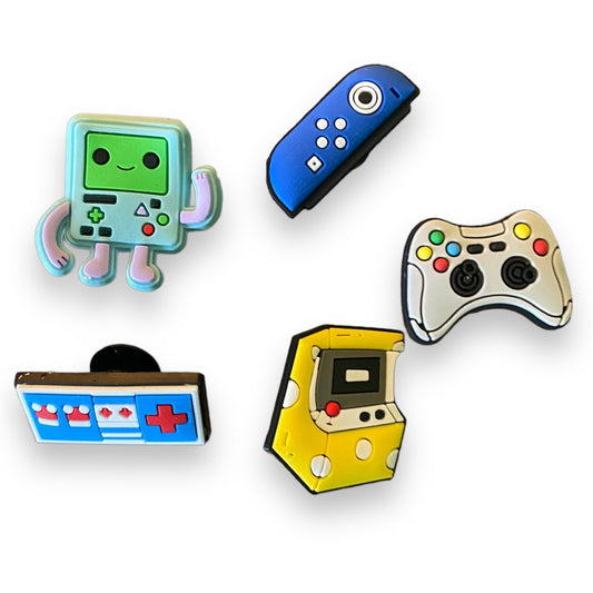 Set of 5 video game show charms on a white background