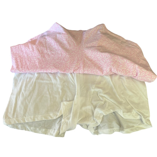 Pink and white boxer briefs on a white background