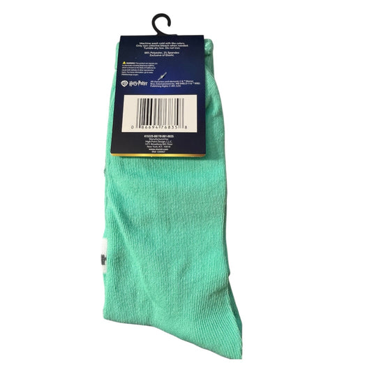 Green sock with a label on a white background