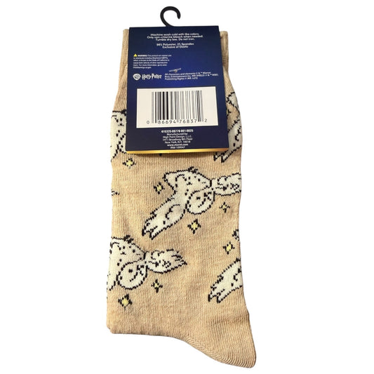 Back of Beige sock with owl pattern on a white background