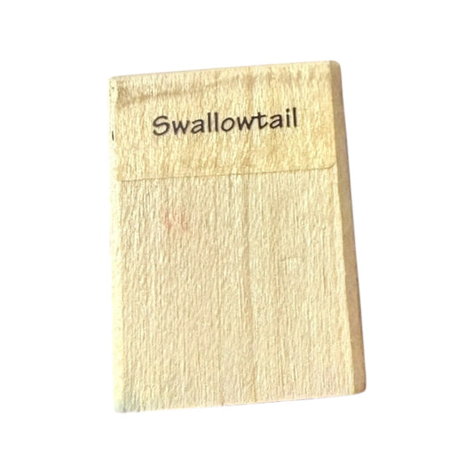 Wooden stamp with 'Swallowtail' branding on a white background