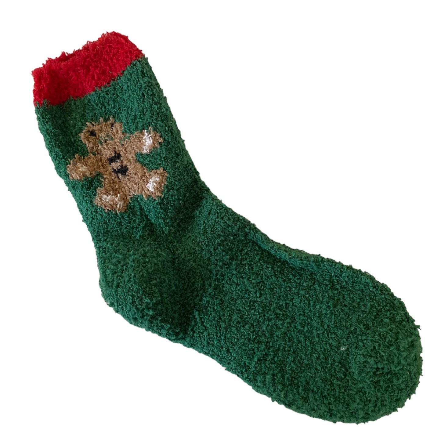 A dark green fuzzy slipper sock with a red cuff and a brown gingerbread man design on the side, shown against a plain white background.