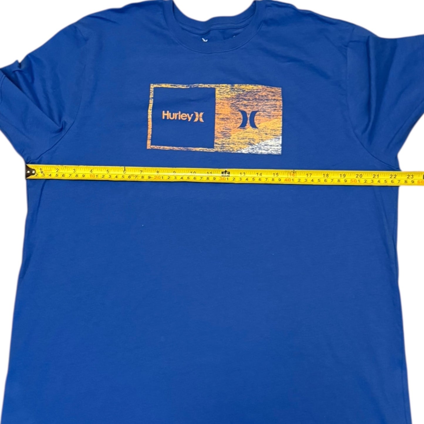 Blue t-shirt with aHurley logo measurement shown
