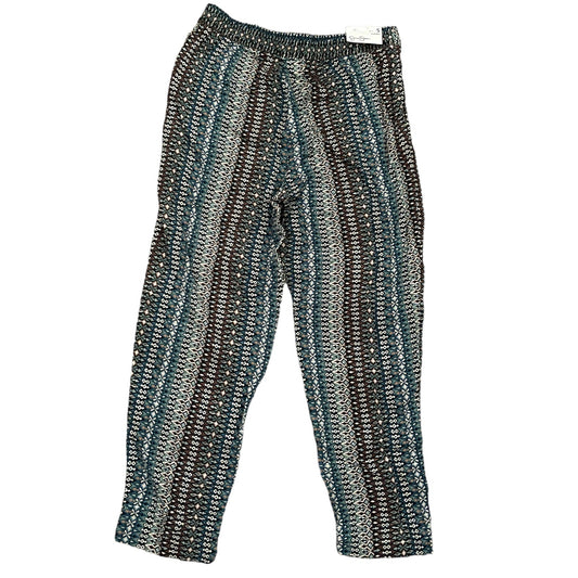 A pair of cropped pants featuring a vertical striped pattern in teal, gray, black, and white, shown against a plain white background.